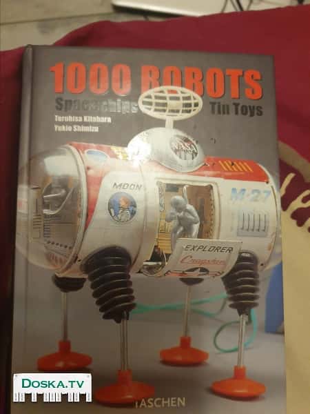 Книга известного производителя фотоальбомов по истории.фото игрушек за 100 лет.