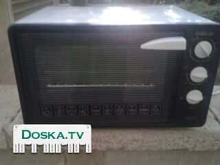 духовку. Новая. В быту не использовалась так как купили новую