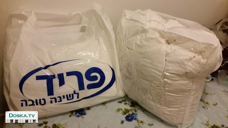 новое пуховое одеяло 100% пух и 2 подушки фирмы "Фрид".