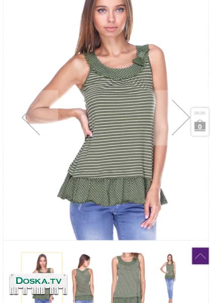 Красивая туника слегка расклешенного силуэта длиной до середины бедра из