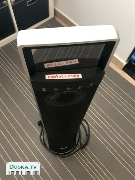 Вертикальный обогреватель с пультом дистанционного управления. Показывает температуру и режим