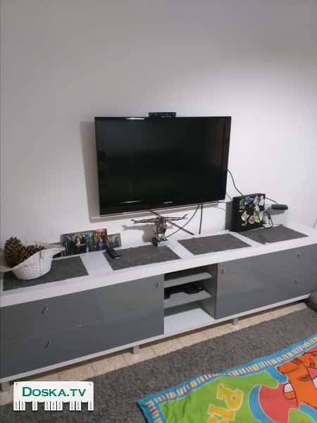 Под телевизор.