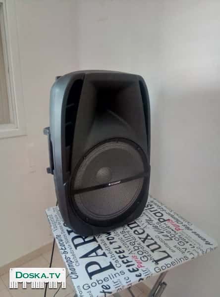 Светомузыкальная колонка-чемодан  караокес микрофоном.Это отличная портативная колонка c качественным