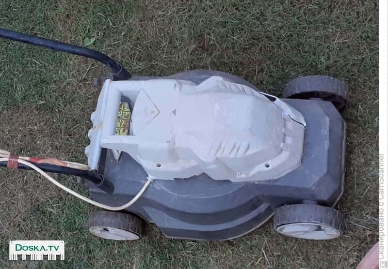 На продажу электрическая газонокосилка в рабочем  состоянии. ВОЗМОЖЕН ОБМЕН