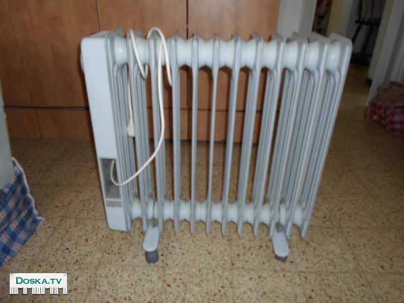 Масляный обогреватель радиатор  12 колонок б/у в отличном состоянии