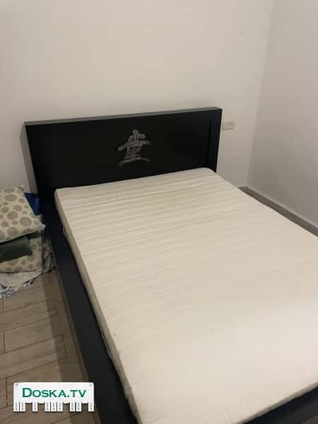 двуспальную кровать в отличном состоянии  Размер 2м в длину