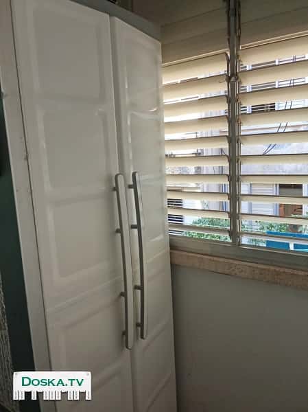 Серый хоз.шкаф в хорошем состоянии